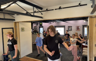 High School Summer Music Camp Workshop | Lott Music Studio High school students participating in a music workshop during summer music camp at Lott Music Studio in Ames, IA.