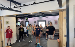 High School Camp Breathing Exercise | Lott Music Studio High school students practicing a breathing exercise during summer music camp at Lott Music Studio in Ames, IA.