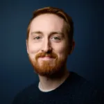 Professional headshot of Quinton Nespor, percussion instructor at Lott Music Studio.