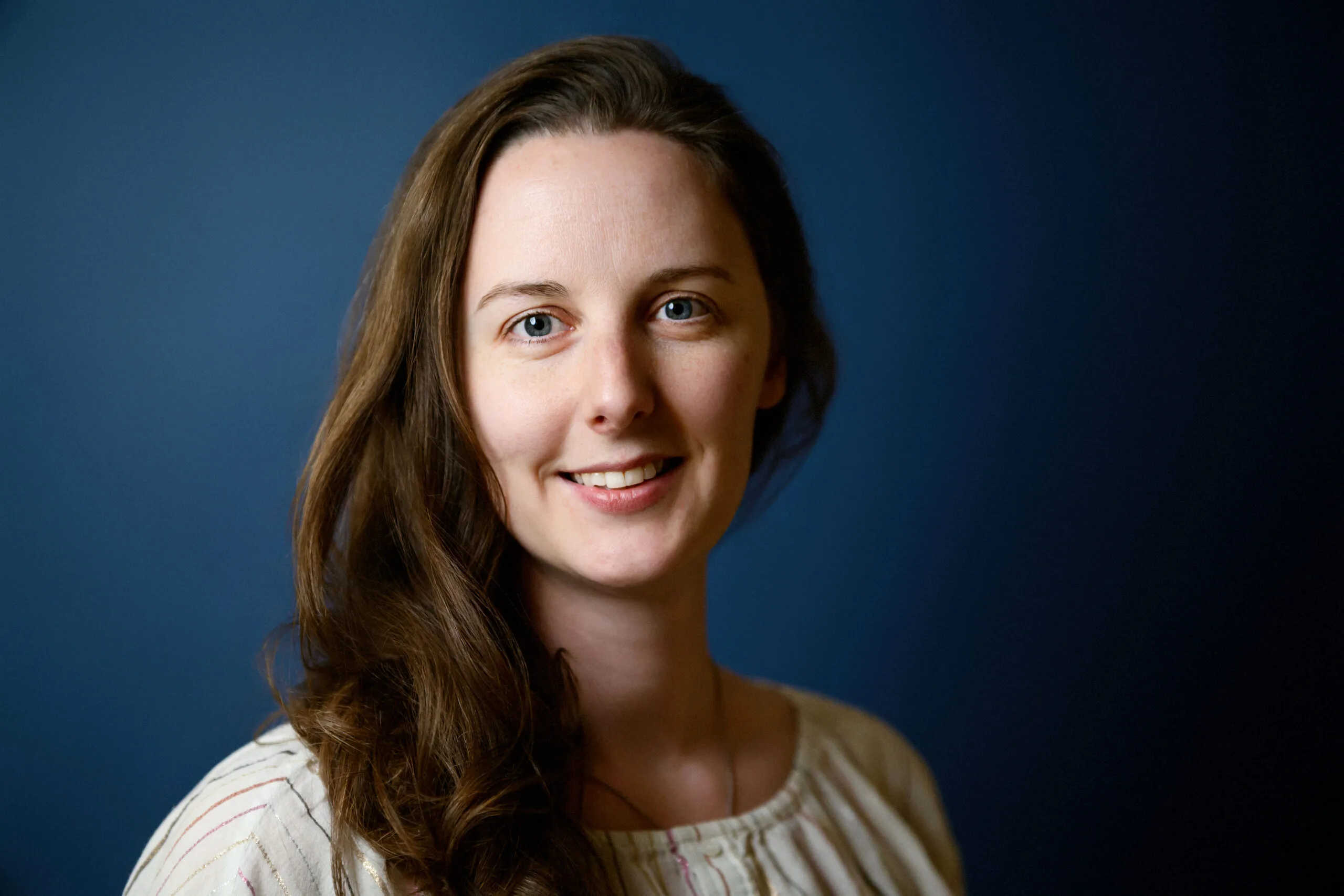 Professional headshot of Sarah Reeves, piano instructor at Lott Music Studio.
