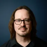 Professional headshot of Scott Gunderson, piano instructor at Lott Music Studio.