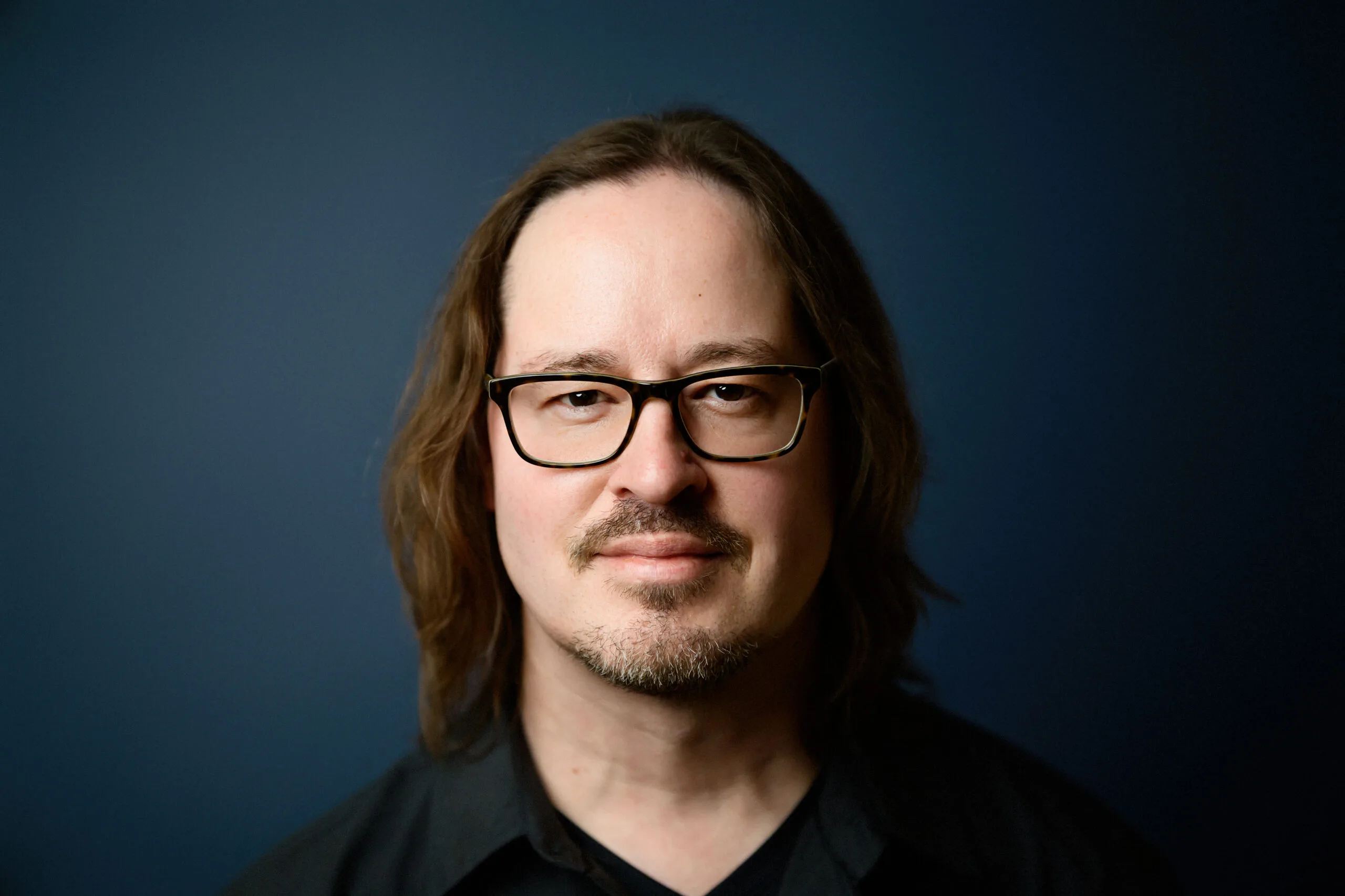 Professional headshot of Scott Gunderson, piano instructor at Lott Music Studio.