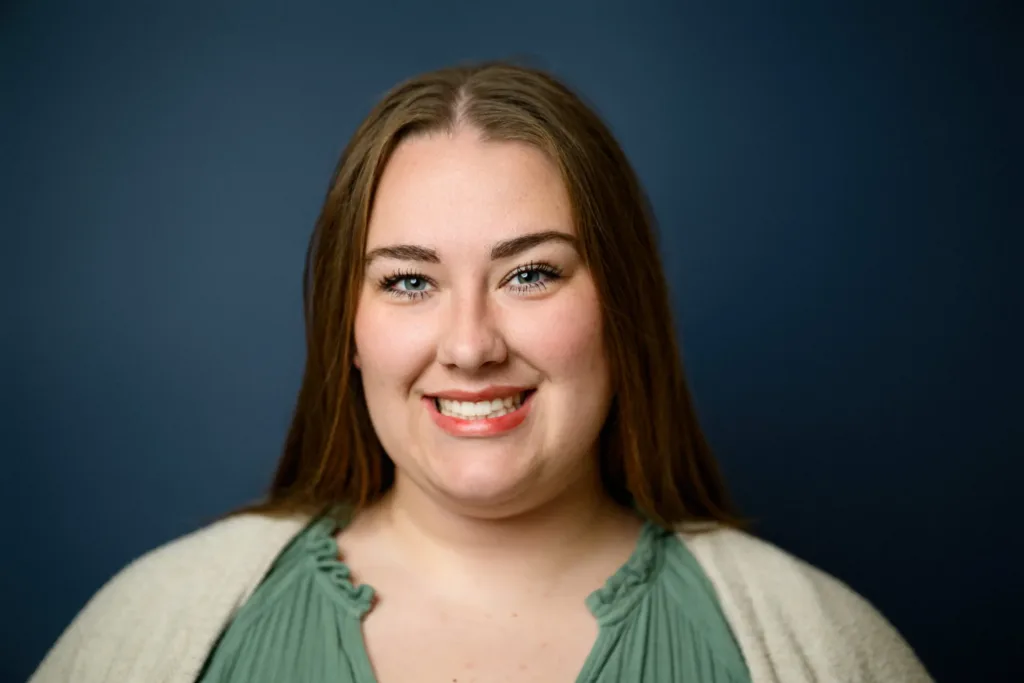 Professional headshot of Taylor Oldham, voice and piano instructor at Lott Music Studio.
