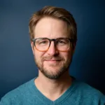 Professional headshot of Mike Givens, Piano and Voice Teacher at Lott Music Studio.